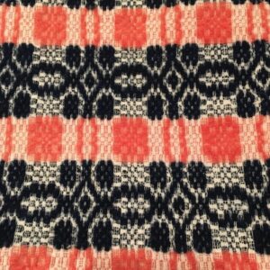 Whig Rose pattern using peach and navy wool threads