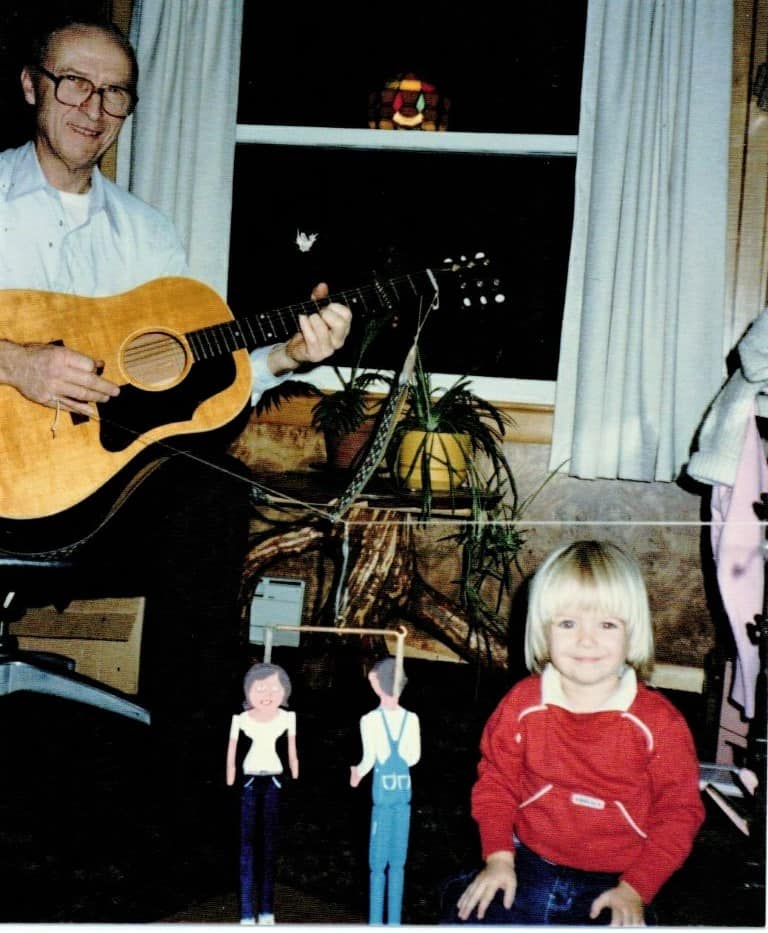 Andy Hylton entertaining a grandchild with his dancing dolls