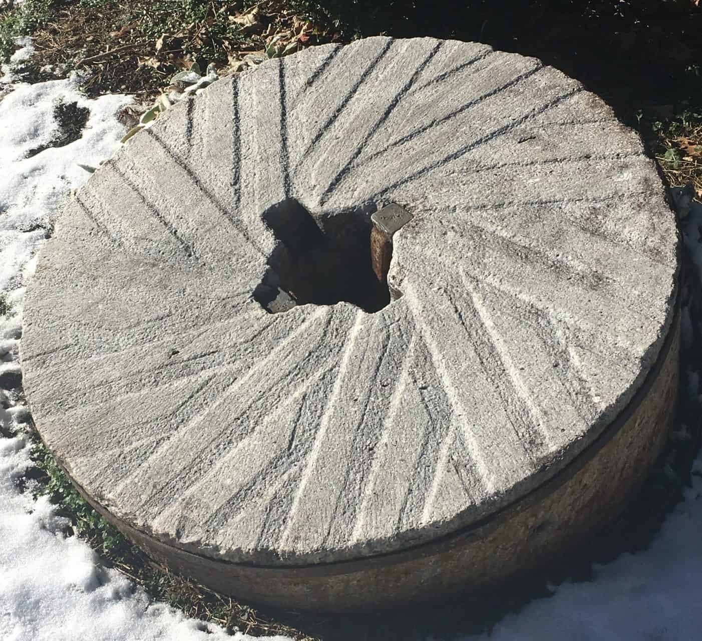 Upper stone from pair of millstones used at the Irvin Huff Mill.>