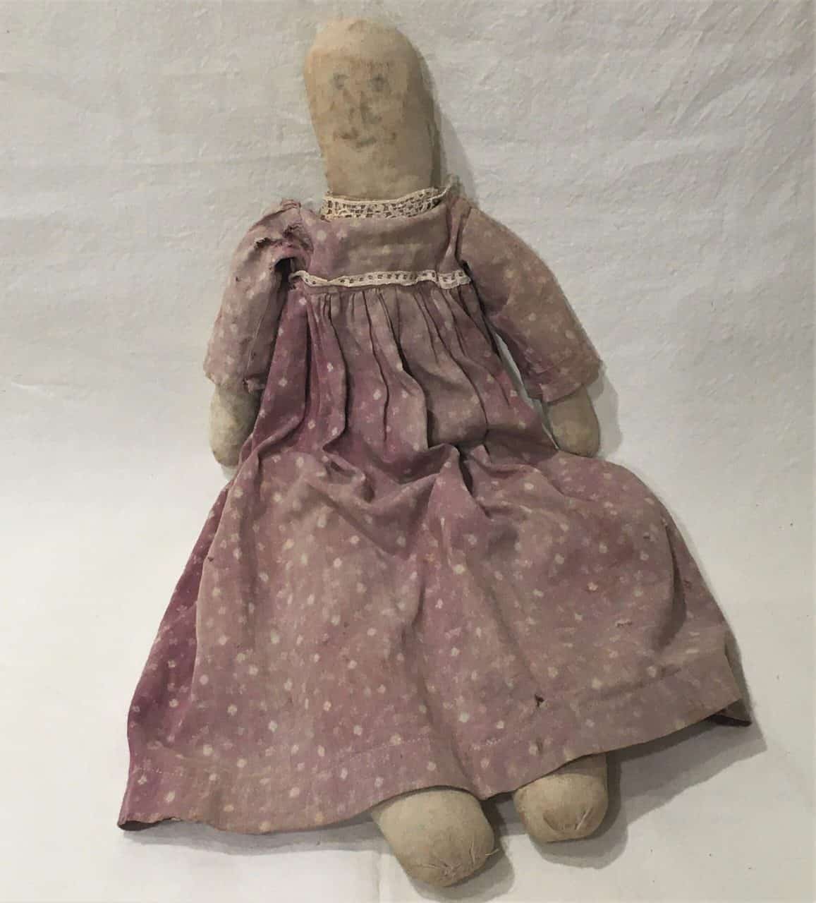 Much-loved doll stuffed with rags.