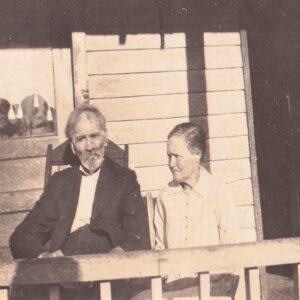 Thomas Merritt and Mattie King sitting on their porch.