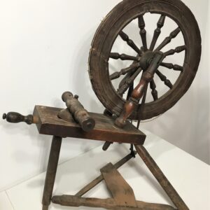 This small spinning wheel was used for spinning flax.